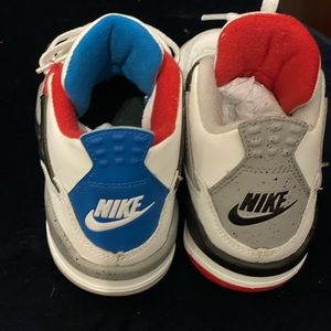 Kid Jordan’s, white blue red and gray